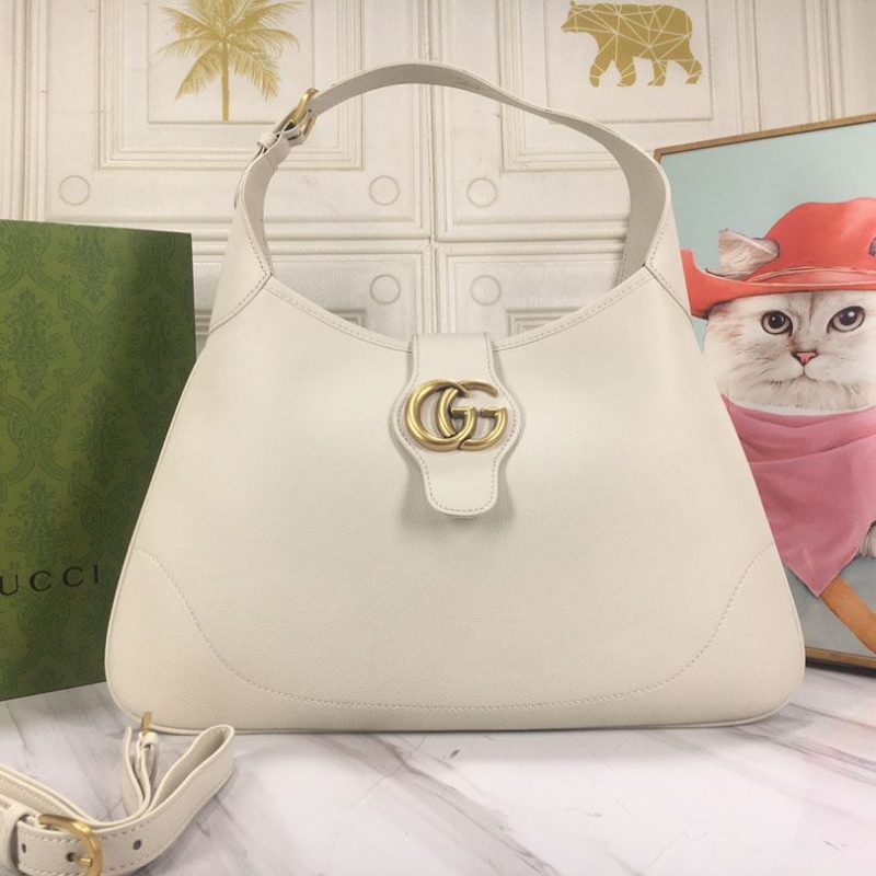 G*u*i top handle bags